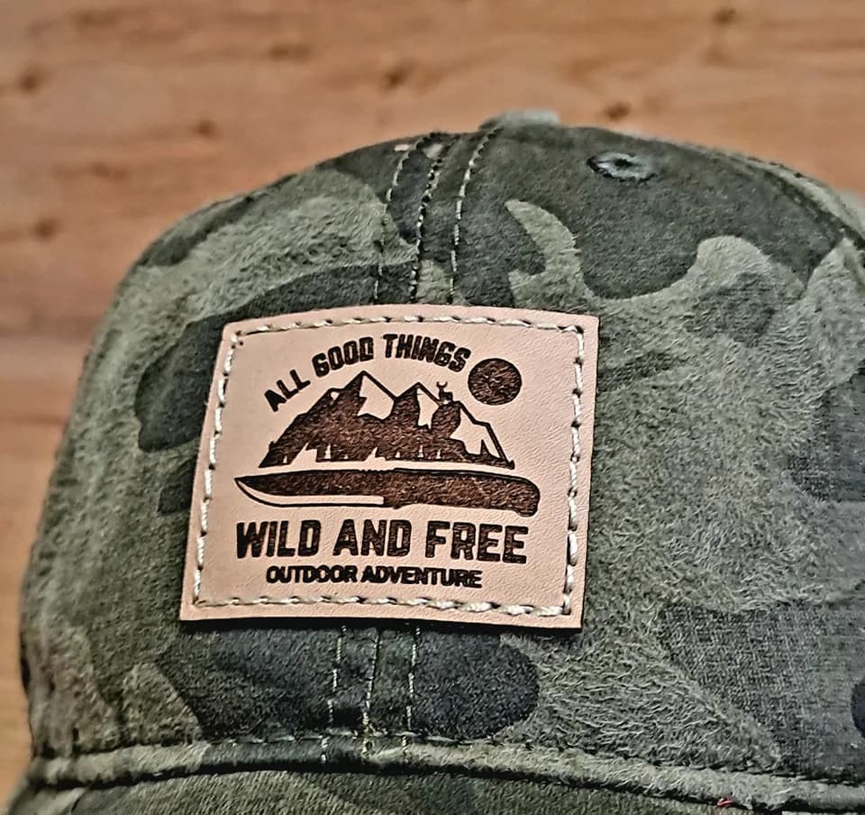 Light leather patch on a camouflage cap